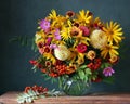 Autumn bouquet with garden flowers and berries. Royalty Free Stock Photo