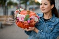 autumn bouquet in pumpkin in the hands of woman. Decoration for Thanksgiving day. Royalty Free Stock Photo