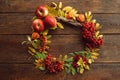 Autumn bouquet ripe wreath wood surface concept