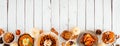 Autumn breakfast or brunch buffet border against a white wood banner background. Above view with copy space. Royalty Free Stock Photo