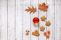 Autumn breakfast with a cup of tea, cookies and fallen leaves Royalty Free Stock Photo