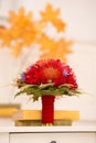 Autumn bridal bouquet of red color with books