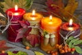 Autumn candles with leaves vintage abstract still life