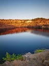 Autumn canyon lake in sunset red color light Royalty Free Stock Photo