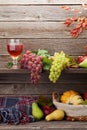 Autumn card with pumpkins, fruits and wine Royalty Free Stock Photo
