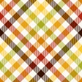 Autumn check pattern. Multicolored gingham vichy tartan in brown, red, orange, green, yellow, off white for tablecloth. Royalty Free Stock Photo