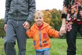 Autumn child with family