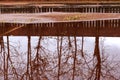 Autumn city background. Puddles on playground in rainy weather. Wet tennis court after rain Royalty Free Stock Photo