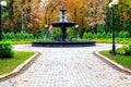 Autumn city landscape. Beautiful old fountain in the autumn park after the rain. Mariinsky Park near the Parliament of Ukraine,