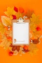 Autumn clipboard mockup with fall leaves