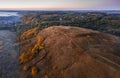 Autumn cold morning nature. Hill and valley. Aerial drone photo.