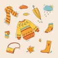 Autumn color doodles. Hand drawn color vector set of sketches: jumper, umbrella, boots, cloud, leaves, scarf. Autumn walking, fall