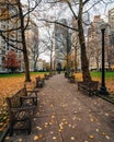 Autumn color and walkway at Rittenhouse Square Park, in Philadelphia, Pennsylvania