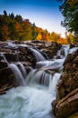 Autumn color and waterfall at Rocky Gorge, on the Kancamagus Highway, in White Mountain National Forest, New Hampshire.