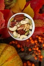 Autumn colorful still life with leaves and nuts