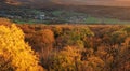 Autumn colorful sunset with village and forest, Slovakia - castle Pajstun