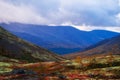 Autumn colorful tundra on the background mountain peaks. Mountain landscape in Kola Peninsula, Arctic, Khibiny Mountains