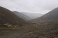 Autumn colorful tundra on the background mountain peaks. Mountain landscape in Kola Peninsula, Arctic, Khibiny Mountains