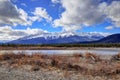 Autumn colors of Athabasca River with Roche De Smet Mountain in the distance