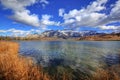 Autumn colors of Athabasca River with Roche De Smet Mountain in the distance