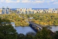 Landscape of the autumn city of Kyiv with a view of the Dnipro River, a branch and a subway bridge, Hydropark and the left bank of