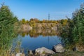 Autumn colors in sunny day on lake in city park. Landscape golden foliage. Royalty Free Stock Photo