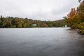 Autumn colours around a mountain lake on a rainy day Royalty Free Stock Photo