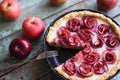 Autumn comfort food. Homemade imperfect pie with apple roses in Royalty Free Stock Photo