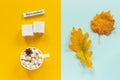 Autumn composition. Blank wooden white cubes mockup and November for your calendar data, cup of cocoa with marshmallows and yellow