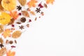 Autumn composition. blanket, autumn leaves and pumkin on white background. Flat lay, top view copy space