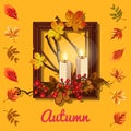 Autumn composition: candles and photo frame