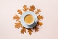 Autumn composition, fall leaves, hot steaming cup of coffee Royalty Free Stock Photo