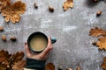 Autumn composition. Frame made of Pumpkins,dried leaves, pine cones and tes cup background. Template autumn, fall, halloween, Royalty Free Stock Photo