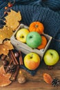 Autumn composition over wooden background. Apples, Royalty Free Stock Photo