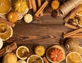 Autumn composition.Pumpkin candles,spicy star anise spices and cinnamon on a wooden background. Royalty Free Stock Photo