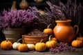 Autumn composition of pumpkin, heather and colorful flowers in pots