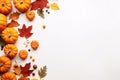 Autumn composition with pumpkins, leaves and berries on white background Royalty Free Stock Photo