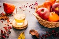 Autumn composition with pumpkins, autumn leaves, red apples and apple cider Royalty Free Stock Photo