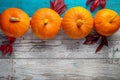 Autumn composition. Pumpkins on white blue background. Top view