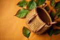 Autumn composition. Straw bag with autumn dried leaves on green background. Flat lay. Top view. Copy space. Fall season Royalty Free Stock Photo