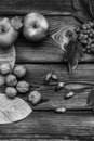 Autumn composition on a wooden background. Apples, viburnum, leaves and flowers