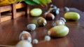 Autumn composition of yellow and red maple, linden and oak leaves with caps and acorns on a brown background macro Royalty Free Stock Photo