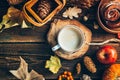Autumn concept. Delicious coffee on wooden background