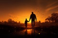 Autumn connection silhouettes of a father and son handinhand at sunset Royalty Free Stock Photo