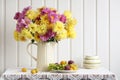 Autumn cottage still life with a bouquet of chrysanthemums, plums and grapes. Flowers and berries Royalty Free Stock Photo