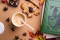 Autumn cozy composition with book at wooden table. life style concept. flat lay