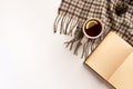 Autumn, cozy composition. Cup of tea, warm scarf, book, isolated on white background Royalty Free Stock Photo