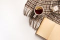 Autumn, cozy composition. Cup of tea, warm scarf, book, isolated on white background Royalty Free Stock Photo