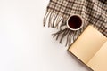 Autumn, cozy composition. Cup of tea, warm scarf, book, isolated on white background Royalty Free Stock Photo