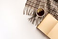 Autumn, cozy composition. Cup of tea, warm scarf, book, isolated on white background Royalty Free Stock Photo